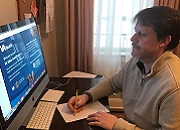 Navy Veterans Conan O’Rourke using the VA Telehealth system to connected to healthcare providers from his home.